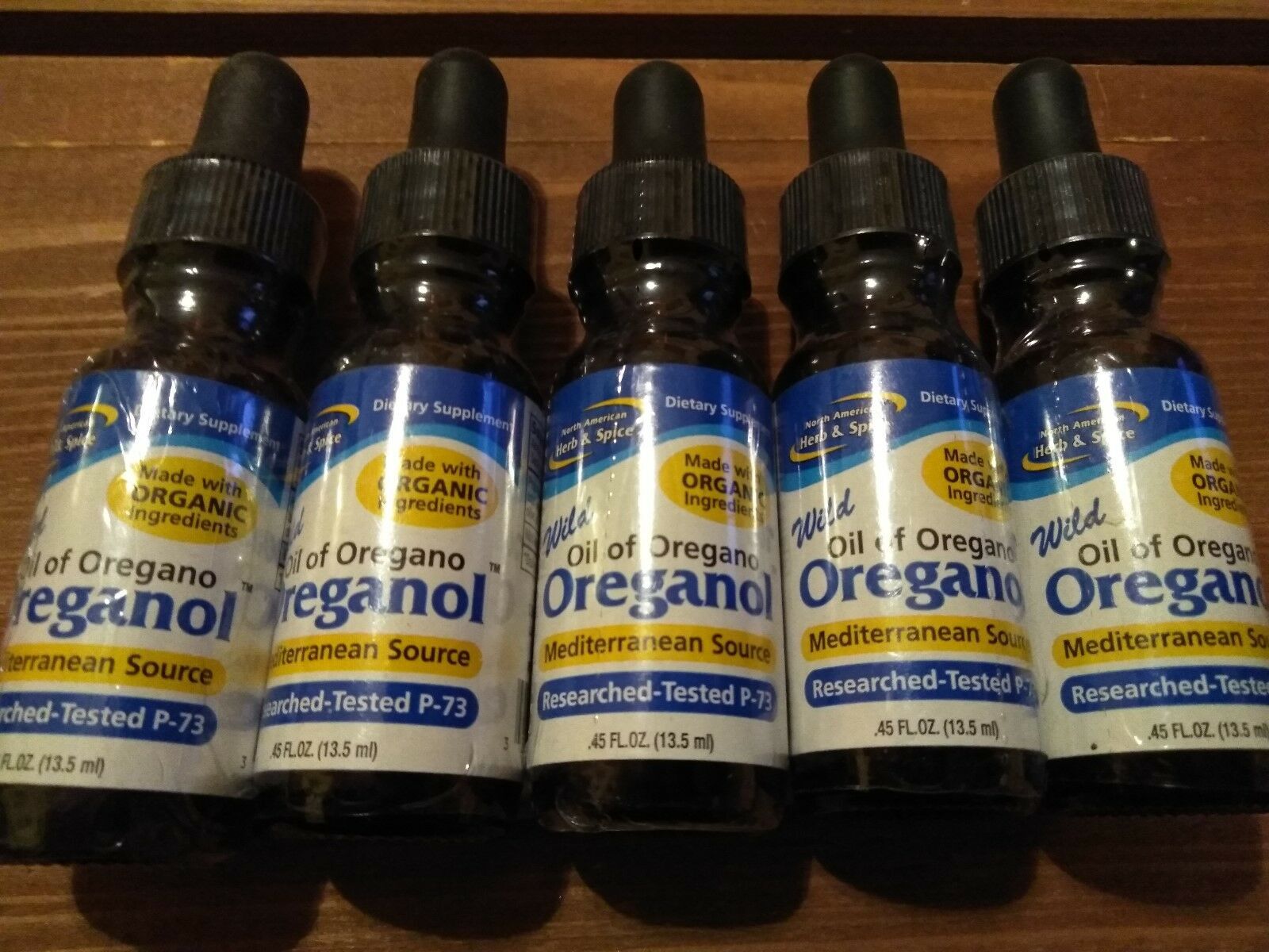 5 bottles north american herb and spice oil of oreganol P73 .45 fl oz
