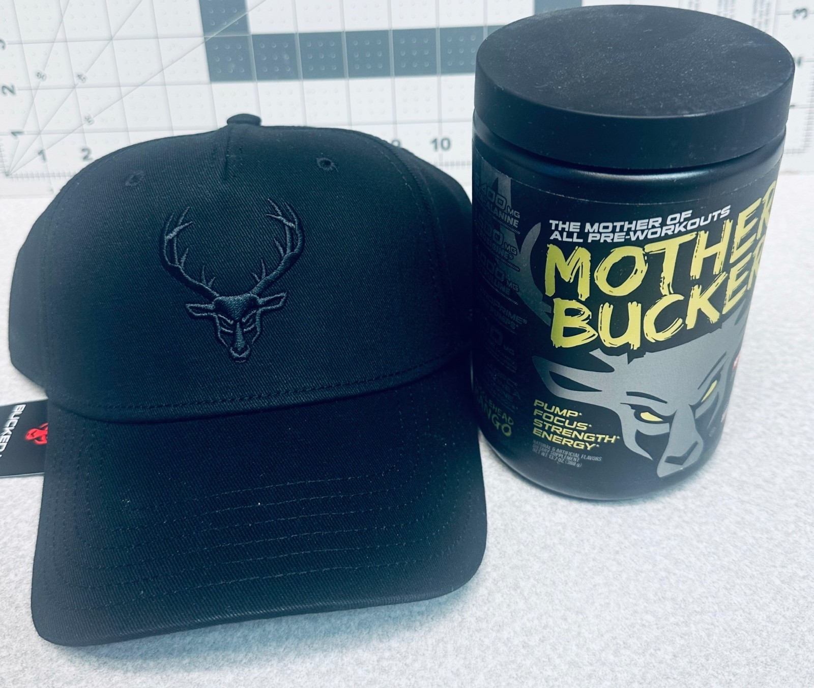 BUCKED UP MOTHER BUCKER PRE-WORKOUT Pump Focus Strength With buked up Hat Mango